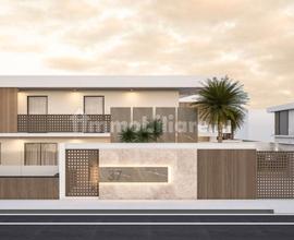 Villa a schiera con porticato