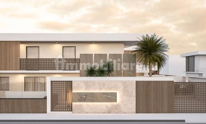 Villa a schiera con porticato