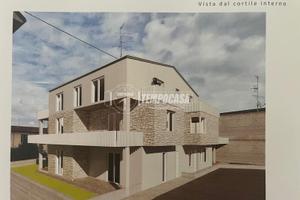 TRILOCALE NUOVO PIANO TERRA CON GIARDINO E POSTI A