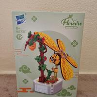 Mattoncini da assemblare insetto con ali e pianta