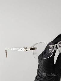 occhiali cartier rimless C decor