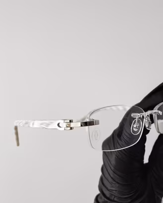 occhiali cartier rimless C decor