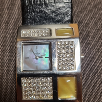 Orologio a fascia larga nero con brillanti e pietr