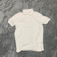 polo Lacoste bianca.