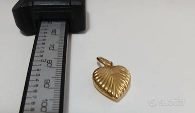 1 ciondolo oro 750 a forma di cuoricino Grande