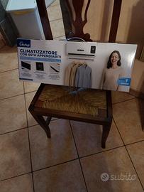 climatizzatore con asta appendiabiti 