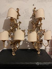 Coppia di applique in legno dorato