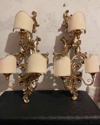 Coppia di applique in legno dorato