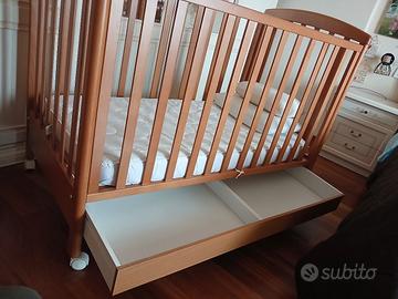 lettino con ruote e cassetto 