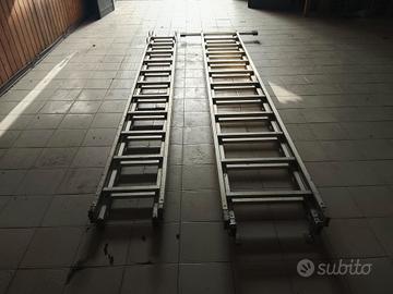 scala alluminio a cavalletto e allungabile 12 mt  