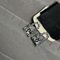 orecchini cc forma borsa
