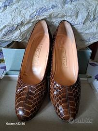 Scarpe in pelle cobra. Cipollini 