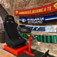 Simulatore di guida con volante e pedaliera