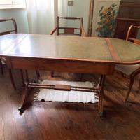 Antica scrivania regency rotelle pelle