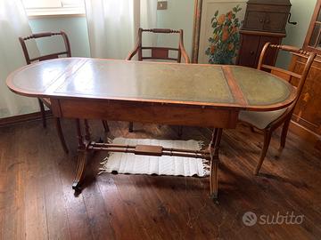 Antica scrivania regency rotelle pelle