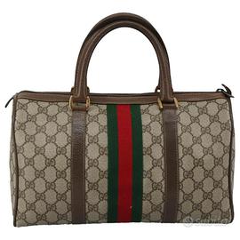 Borsa della frizione suprema di Gucci GG