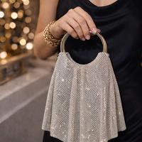 Pochette argento con manici ad anelli