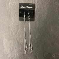 Orecchini pendenti lunghi con stelline