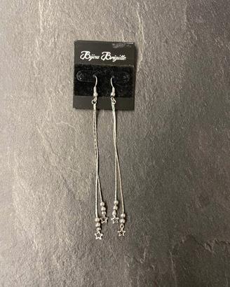 Orecchini pendenti lunghi con stelline