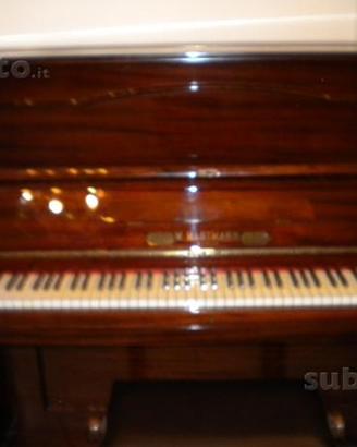 Pianoforte verticale in mogano