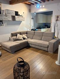 Divano letto con penisola e contenitore