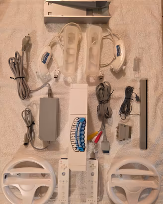 Nintendo Wii + 2 Controller Nunchuk Volantini