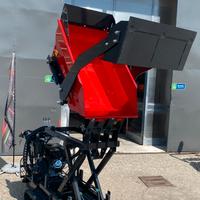 Motocarriola autocaricante telescopica