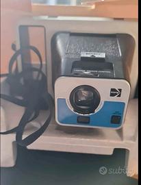 macchina fotografica calcolatrice parlante geloso