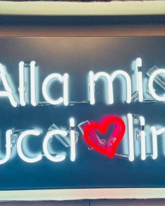 insegna luminosa