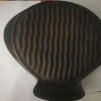 Antica piastra in ghisa