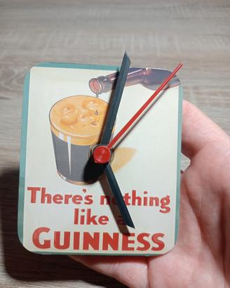 Guiness orologio da muro vintage.