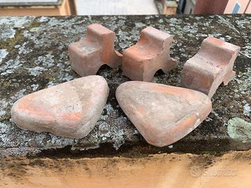 Piedini in terracotta