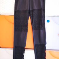 Pantacollant neri con intermezzi di pizzo