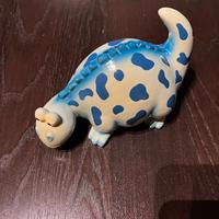 Salvadanaio a forma di dinosauro