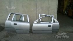 Porte Opel Astra SW 2000 grigio ch e blu