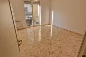 Appartamento con posto auto e veranda