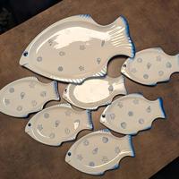 Servizio piatti a forma di pesce
