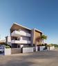 trilocale-con-doppio-bagno-giardino-e-posto-auto