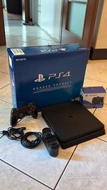 Ps4 slim 1tb + carica joystick + 2 giochi
