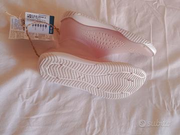 Scarpe rosa trasparenti Decathlon