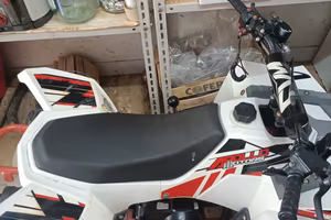 quad 125