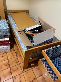 Letto singolo e seggiolina