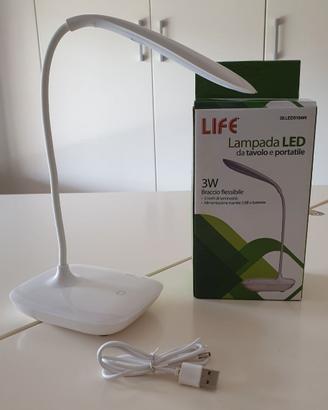 Piccola lampada a led da tavolo e portatile