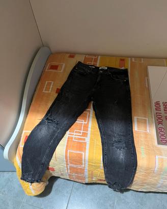 jeans skinny con strappi
