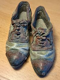 Scultura scarpe in resina