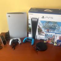 Ps5 con giochi,doppio joystick e base ricarica.