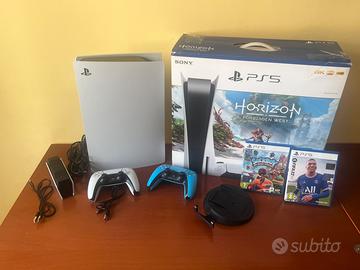 Ps5 con giochi,doppio joystick e base ricarica.