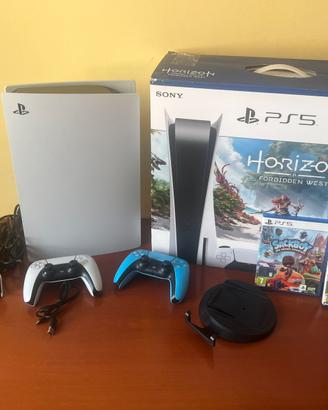 Ps5 con giochi,doppio joystick e base ricarica.