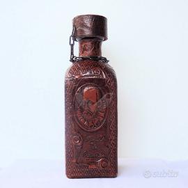 BOTTIGLIA con CERVANTES, foderata in cuoio