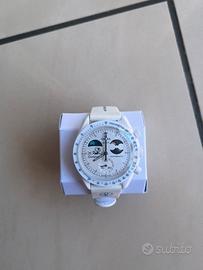 omega swatch mission to earthphase moonshine gold